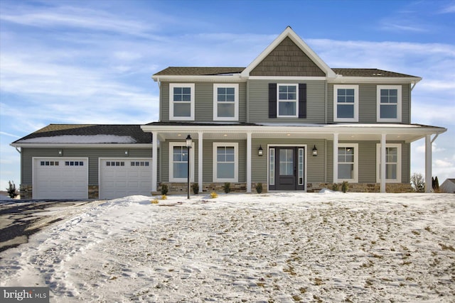 125 Josie Dr, Bellefonte, PA 16823 - view of front facade featuring stone siding, driveway, a garage, and a porch