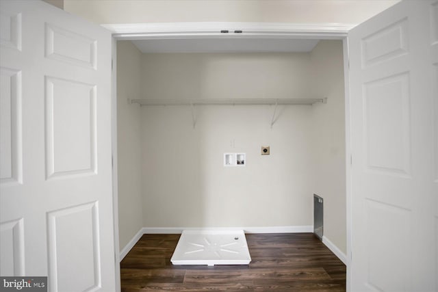 washroom featuring dark hardwood / wood-style flooring, hookup for a washing machine, and hookup for an electric dryer