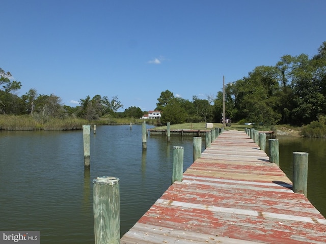 view of dock with a water view