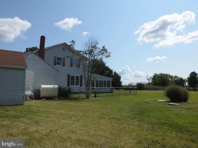 view of yard featuring heating fuel