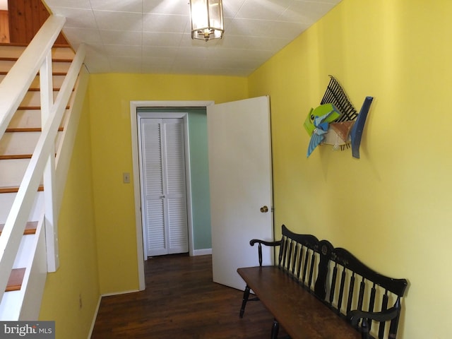 hall with stairway and wood finished floors