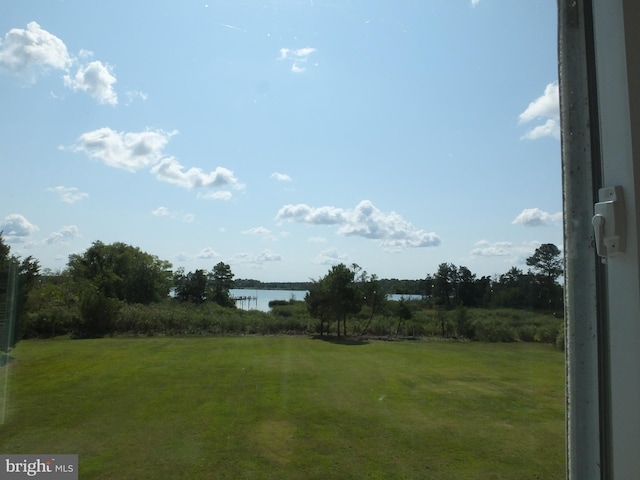 view of yard with a water view