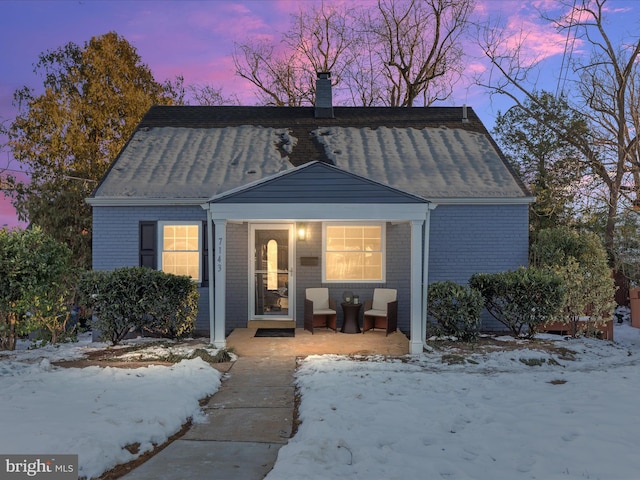 view of front of house featuring covered porch