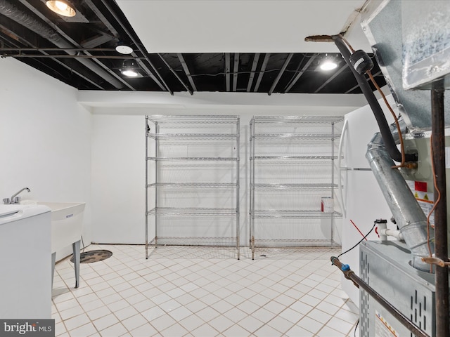 basement featuring light tile patterned flooring