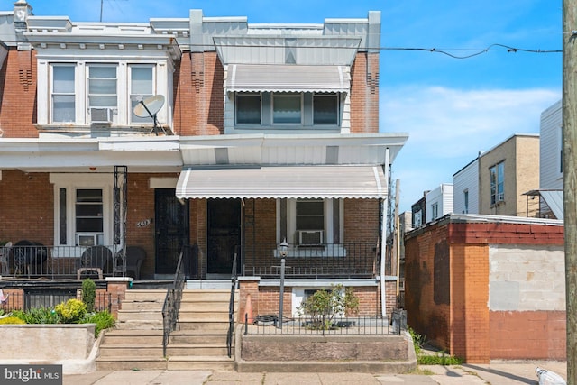 view of property featuring a porch