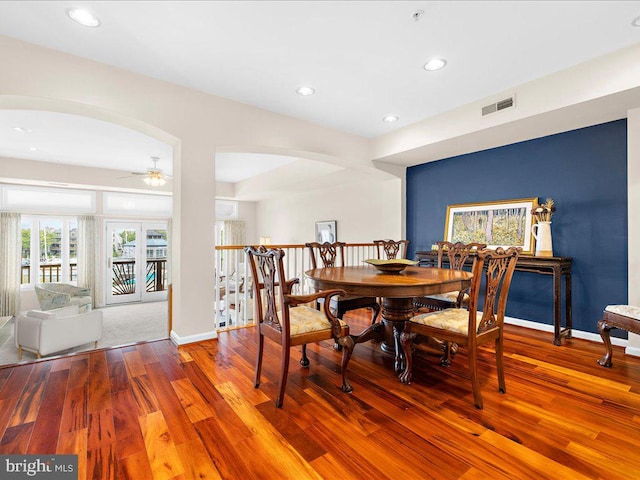 dining room featuring ceiling fan and wood-type flooring