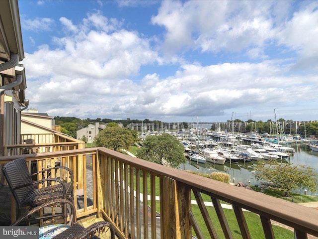 balcony featuring a water view