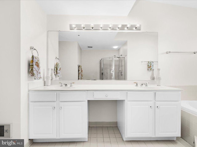 bathroom with vanity, separate shower and tub, and tile patterned floors