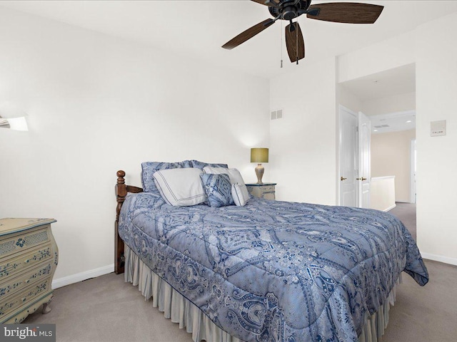 bedroom featuring ceiling fan and light colored carpet