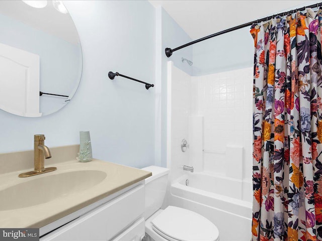 full bathroom featuring vanity, shower / tub combo, and toilet