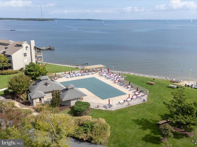 birds eye view of property featuring a water view