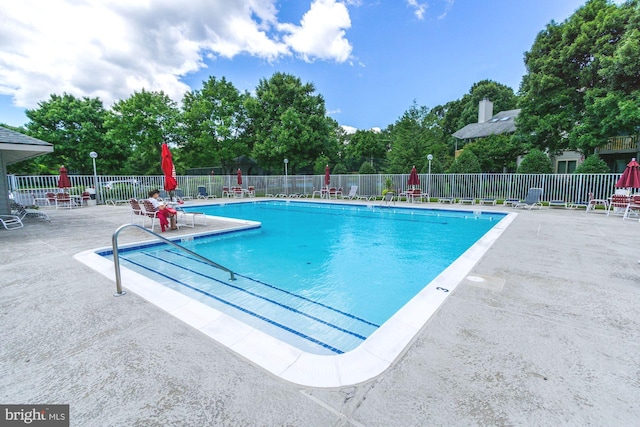 view of pool featuring a patio area