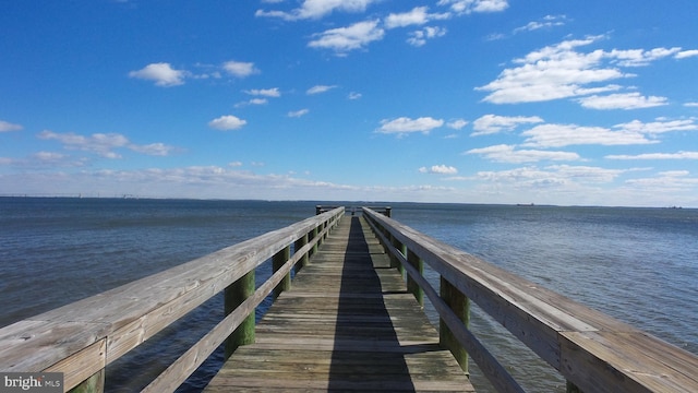 view of dock with a water view