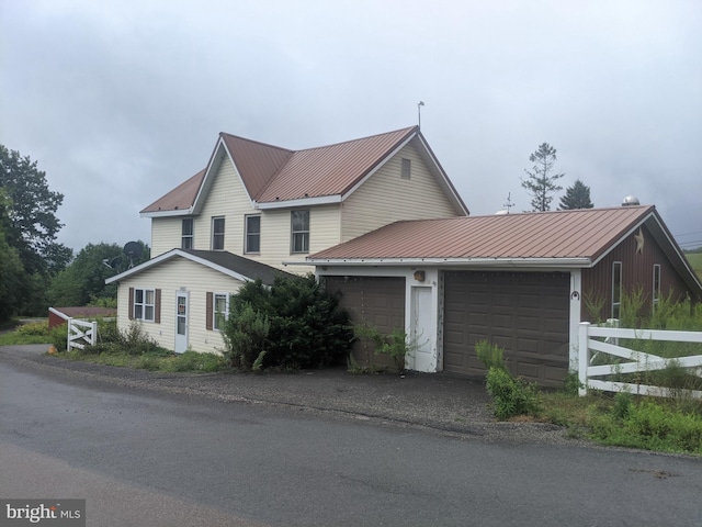 view of home's exterior with a garage