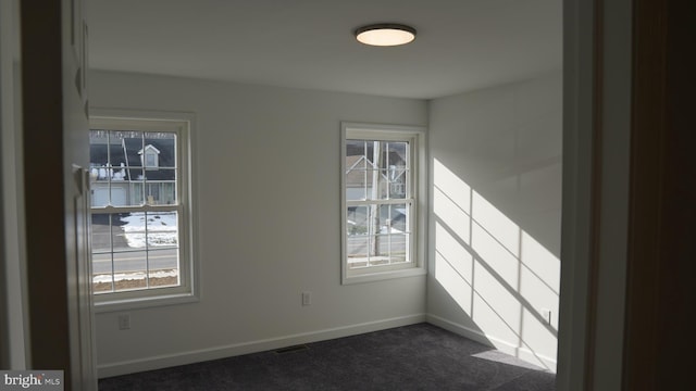 view of carpeted spare room