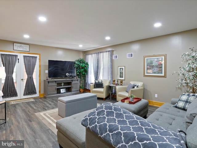 living room with wood-type flooring and french doors