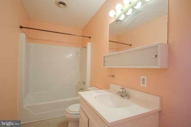 full bathroom featuring vanity, tile patterned flooring, toilet, and shower / bathtub combination