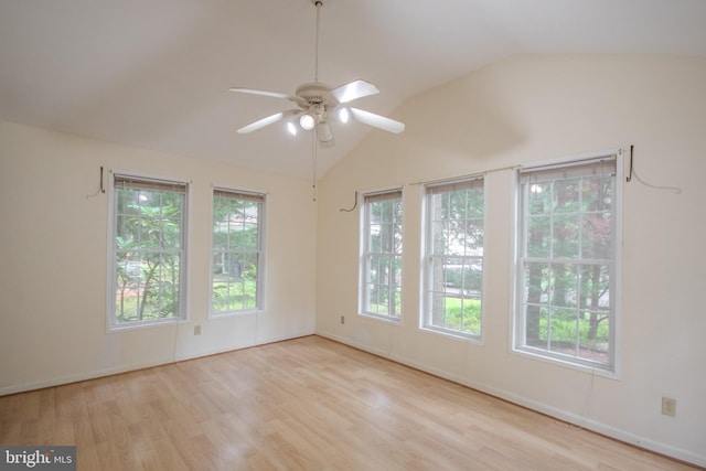 unfurnished room with light wood-type flooring, vaulted ceiling, and ceiling fan