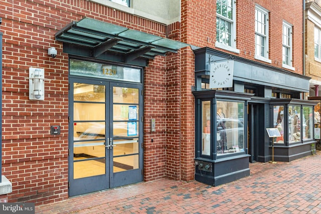 entrance to property featuring french doors