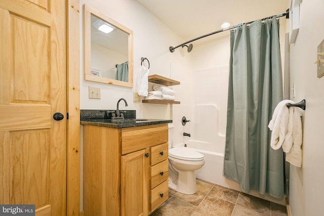 full bathroom with shower / bathtub combination with curtain, vanity, and toilet