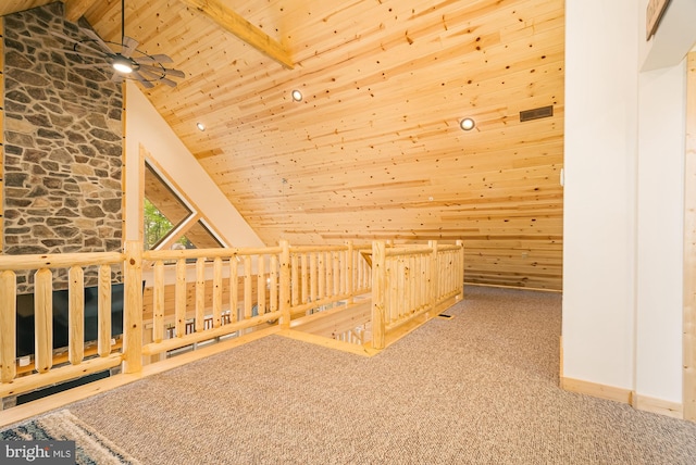 bonus room with wood ceiling, beamed ceiling, wood walls, high vaulted ceiling, and carpet