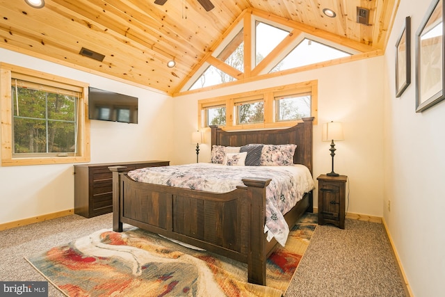 carpeted bedroom featuring multiple windows, vaulted ceiling, ceiling fan, and wooden ceiling