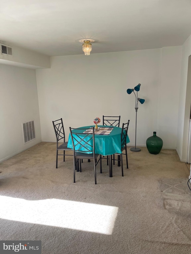 dining room featuring carpet floors