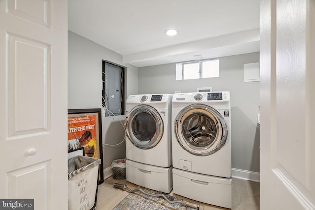 washroom with washer and clothes dryer