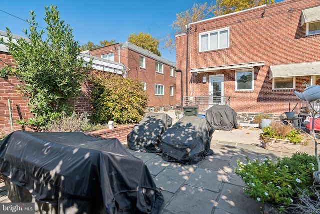 back of house with a patio area