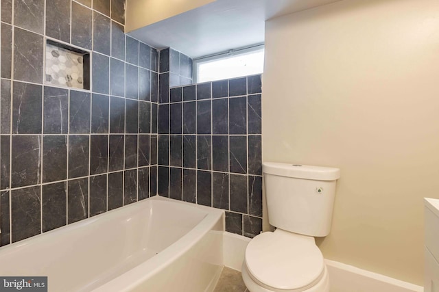 bathroom with a washtub and toilet