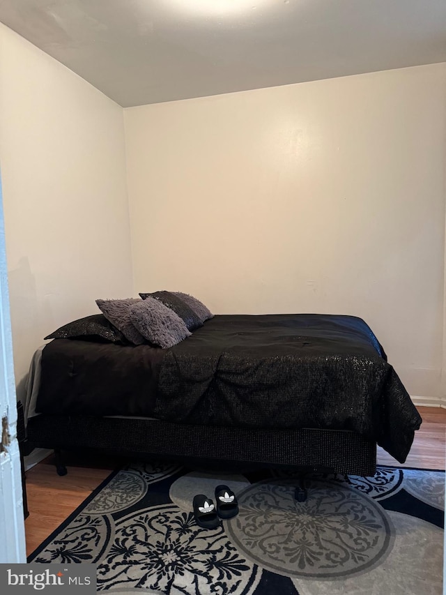 bedroom featuring hardwood / wood-style flooring