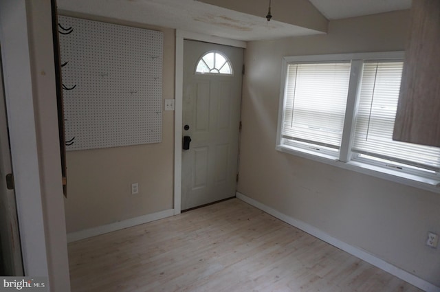 foyer entrance featuring light wood-type flooring