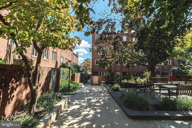 surrounding community with a patio area