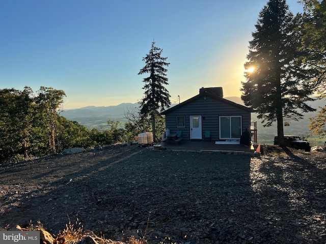 1604 High Knob Rd, Old Fields, WV 26845 - back of property with a patio, a mountain view, and log veneer siding