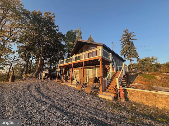 1604 High Knob Rd, Old Fields, WV 26845 - back of house with stairs, a wooden deck, and a patio area
