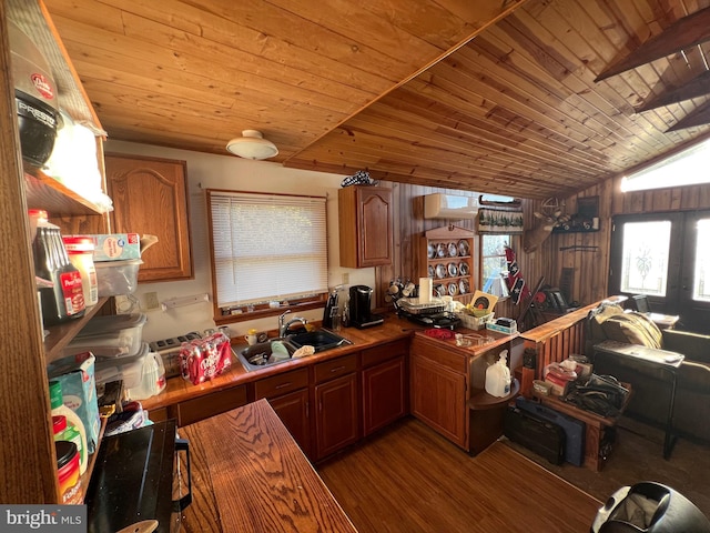 1604 High Knob Rd, Old Fields, WV 26845 - kitchen with wooden ceiling, vaulted ceiling, wood finished floors, brown cabinetry, and a peninsula