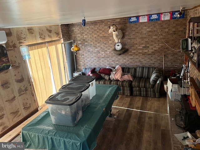 1604 High Knob Rd, Old Fields, WV 26845 - living room with brick wall and wood finished floors