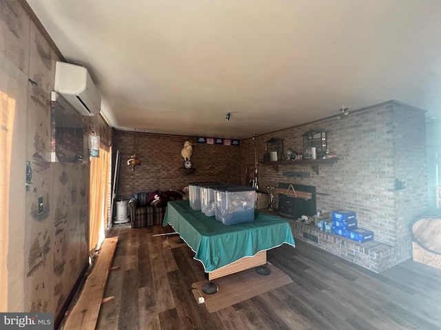 1604 High Knob Rd, Old Fields, WV 26845 - game room featuring a wall mounted AC, wood finished floors, billiards, and brick wall