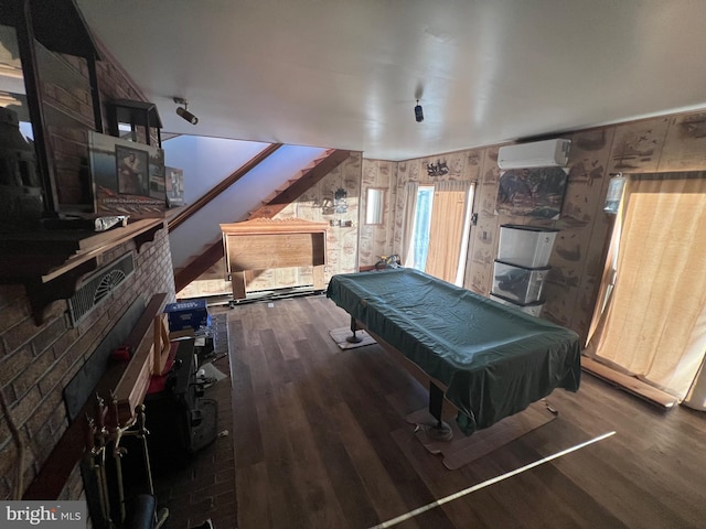 1604 High Knob Rd, Old Fields, WV 26845 - game room featuring wood finished floors, billiards table, an AC wall unit, and wood walls