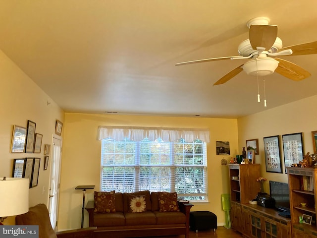 living room featuring ceiling fan