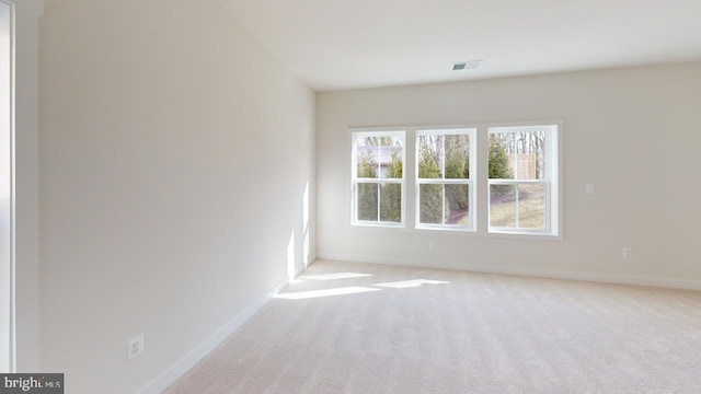 view of carpeted spare room