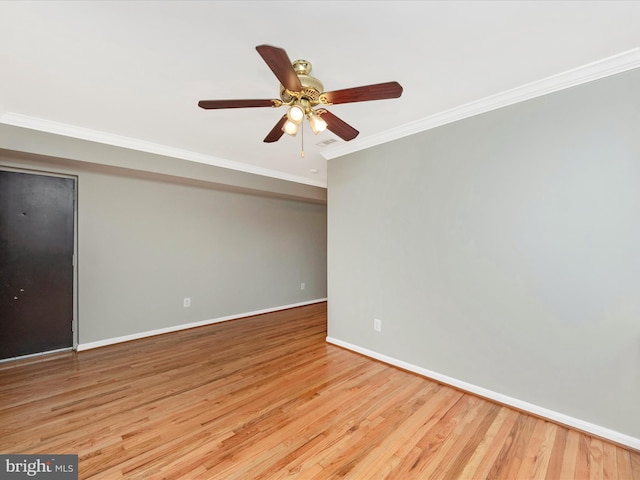 unfurnished room featuring light hardwood / wood-style flooring, ornamental molding, and ceiling fan