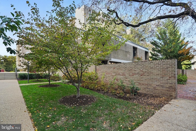 view of home's exterior featuring a yard