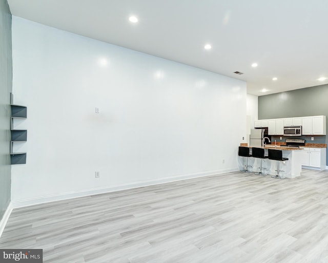 living room with light wood-type flooring