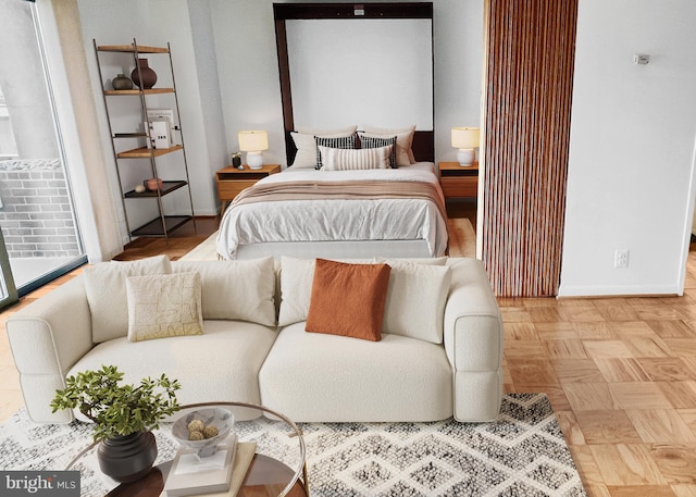 bedroom featuring parquet flooring