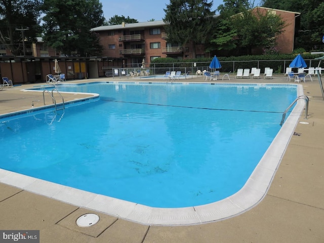 view of pool with a patio area