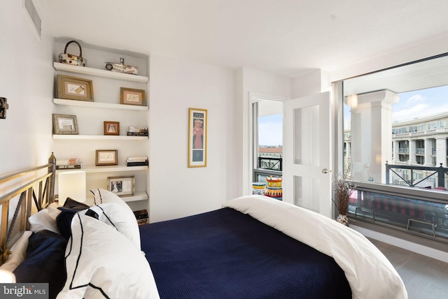 bedroom featuring hardwood / wood-style floors