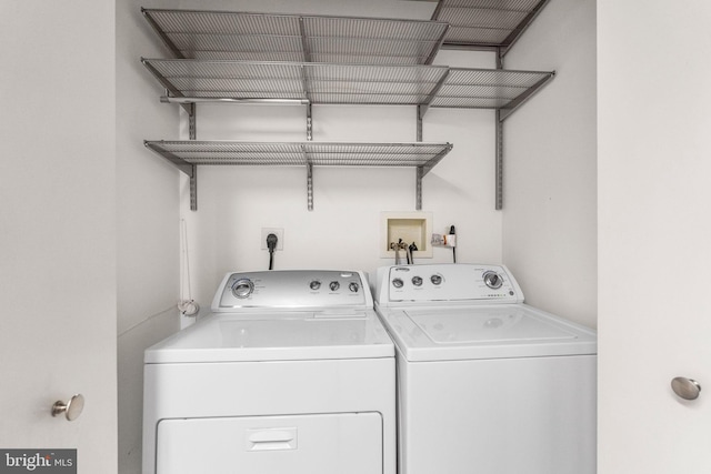 laundry area with washer and clothes dryer