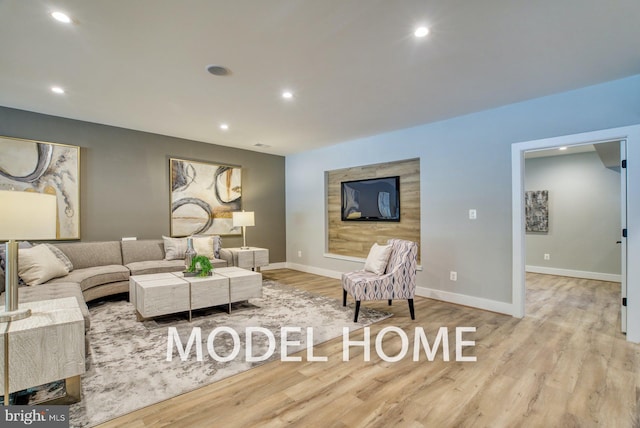 living room with light hardwood / wood-style flooring