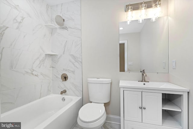 full bathroom with tiled shower / bath, vanity, and toilet